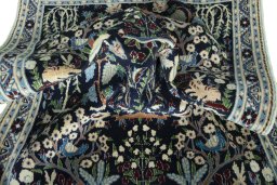 Corner detail of 2000s Nain rug showing border pattern and Wool pile