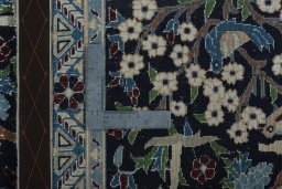 Close-up detail of 2000s Nain rug from Iran / Persia showing Wool weave