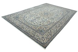 Corner detail of 2000s Nain rug showing border pattern and Wool pile