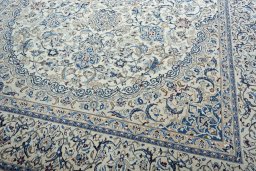 Close-up detail of 2000s Nain rug from Iran / Persia showing Wool weave