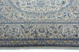 Full view of 2000s Nain rug from Iran / Persia, 503 × 337 cm in Beige tones