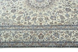 Corner detail of 2000s Nain rug showing border pattern and Cork pile