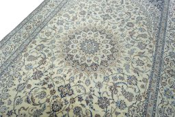 Backside of handmade 2000s Nain rug showing knot structure and weave density