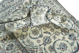 Surface texture of New Nain rug with natural Wool and intricate pattern