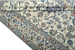 Close-up detail of 2000s Nain rug from Iran / Persia showing Wool weave