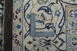 Backside of handmade 2000s Nain rug showing knot structure and weave density