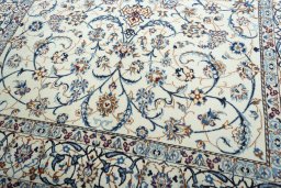 Close-up detail of 2000s Nain rug from Iran / Persia showing Wool weave