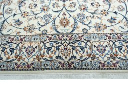 Full view of 2000s Nain rug from Iran / Persia, 306 × 195 cm in Beige tones
