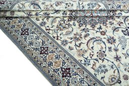 Close-up detail of 2000s Nain rug from Iran / Persia showing Wool weave