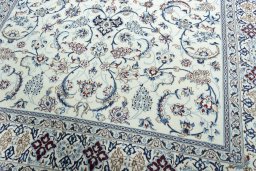 Close-up detail of 2000s Nain rug from Iran / Persia showing Wool weave