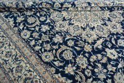 Close-up detail of 2000s Nain rug from Iran / Persia showing Wool weave