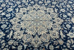 Central medallion detail of 2000s Nain rug from Iran / Persia