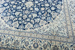 Close-up detail of 2000s Nain rug from Iran / Persia showing Wool weave