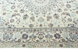 Corner detail of New Nain rug showing border pattern and Wool pile