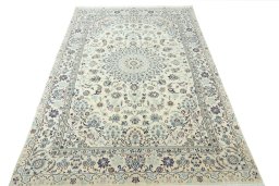 Surface texture of New Nain rug with natural Wool and intricate pattern