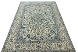 Surface texture of 2000s Nain rug with natural Wool and intricate pattern