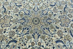 Central medallion detail of 2000s Nain rug from Iran / Persia