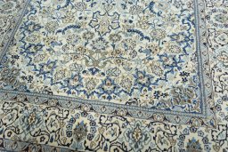 Close-up detail of 2000s Nain rug from Iran / Persia showing Wool weave