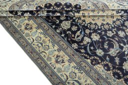 Close-up detail of 2000s Nain rug from Iran / Persia showing Cork weave