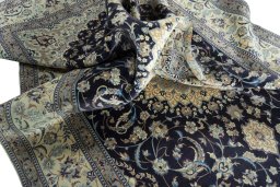 Surface texture of 2000s Nain rug with natural Cork and intricate pattern