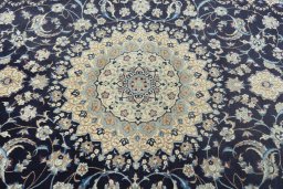 Central medallion detail of 2000s Nain rug from Iran / Persia
