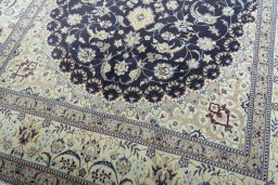Close-up detail of 2000s Nain rug from Iran / Persia showing Cork weave
