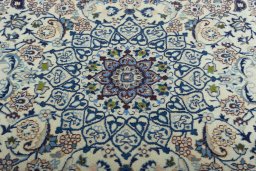 Central medallion detail of 2000s Nain rug from Iran / Persia