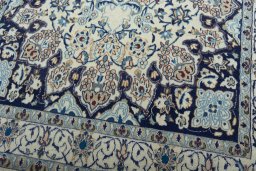 Close-up detail of 2000s Nain rug from Iran / Persia showing Wool weave