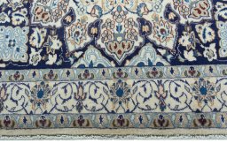 Full view of 2000s Nain rug from Iran / Persia, 203 × 119 cm in Beige tones