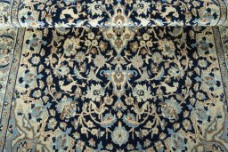 Close-up detail of 2000s Nain rug from Iran / Persia showing Wool weave