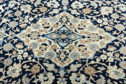 Central medallion detail of 2000s Nain rug from Iran / Persia