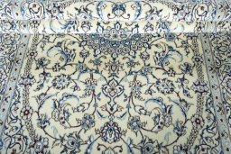 Close-up detail of 2000s Nain rug from Iran / Persia showing Wool weave