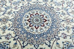 Central medallion detail of 2000s Nain rug from Iran / Persia