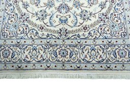 Full view of 2000s Nain rug from Iran / Persia, 256 × 159 cm in Beige tones