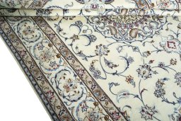 Close-up detail of 2000s Nain rug from Iran / Persia showing Wool weave
