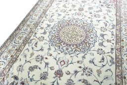 Backside of handmade 2000s Nain rug showing knot structure and weave density