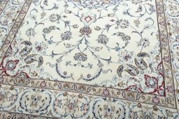 Close-up detail of 2000s Nain rug from Iran / Persia showing Wool weave