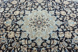 Central medallion detail of 2000s Nain rug from Iran / Persia