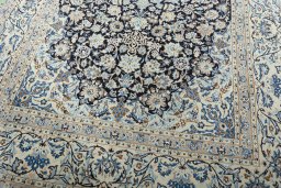 Close-up detail of 2000s Nain rug from Iran / Persia showing Wool weave
