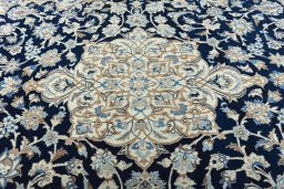 Central medallion detail of New Nain rug from Iran / Persia