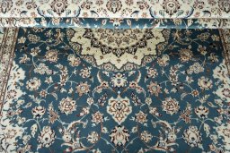 Close-up detail of New Nain rug from Iran / Persia showing Wool weave