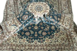 Surface texture of New Nain rug with natural Wool and intricate pattern