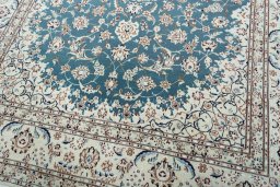 Close-up detail of New Nain rug from Iran / Persia showing Wool weave