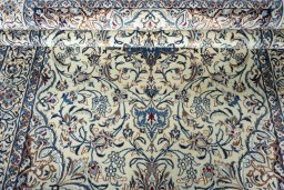 Close-up detail of 2000s Nain rug from Iran / Persia showing Wool weave