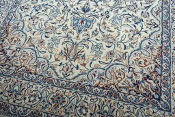 Close-up detail of 2000s Nain rug from Iran / Persia showing Wool weave