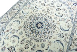 Backside of handmade 2000s Nain rug showing knot structure and weave density