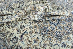 Surface texture of New Nain rug with natural Wool and intricate pattern