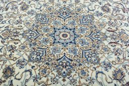Central medallion detail of New Nain rug from Iran / Persia