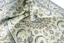 Surface texture of New Nain rug with natural Wool and intricate pattern