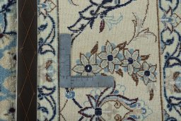 Backside of handmade New Nain rug showing knot structure and weave density